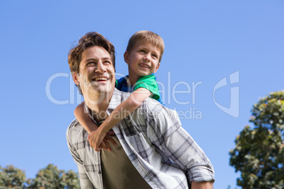 Father and son having fun in the park