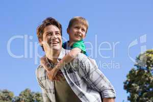 Father and son having fun in the park