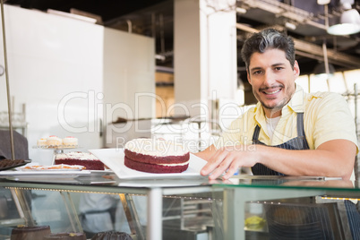 Smiling worker showing red velvet