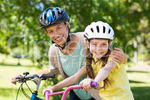 Mother and daughter on their bike