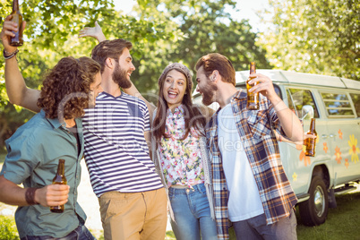 Hipster friends having a beer together