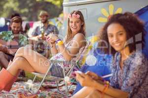 Carefree hipster relaxing on campsite