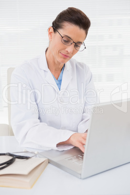 Focus doctor using laptop