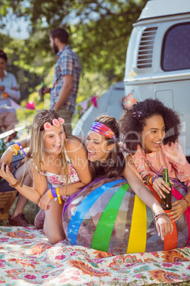 Happy hipsters having fun on campsite