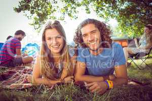 Hipster couple smiling at camera