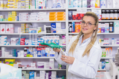 Pharmacist holding medicine