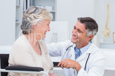 Male doctor looking at female patient