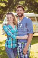 Hipster couple smiling at camera