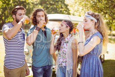 Hipster friends having a beer together