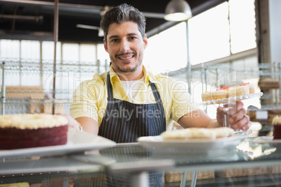 Attractive worker in apron posing