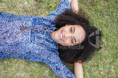 Pretty young woman smiling at camera