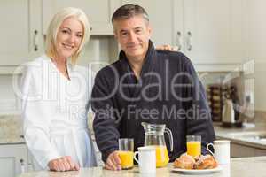 Mature couple having breakfast together