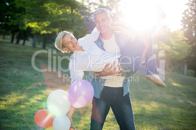 Happy couple having fun at the park