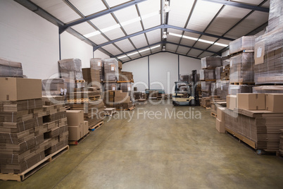 Forklift in a large warehouse