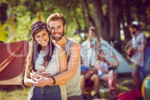 Hipster couple smiling at camera