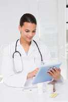 Doctor using tablet pc