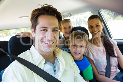Happy family on a road trip