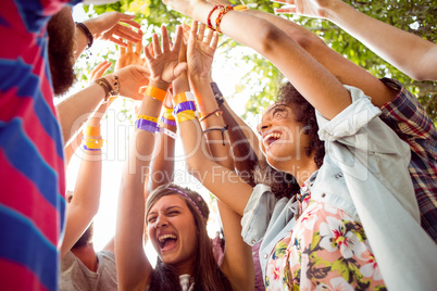 Happy hipsters dancing to the music