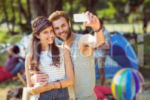 Hipster couple taking a selfie