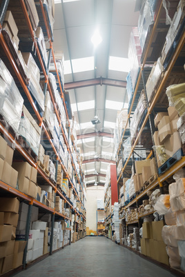 Shelves with boxes in warehouse