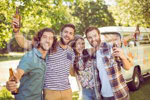 Hipster friends having a beer together