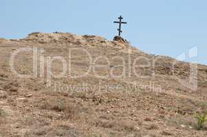 wooden cross on the hill