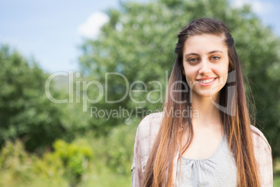 Pretty brunette smiling at camera