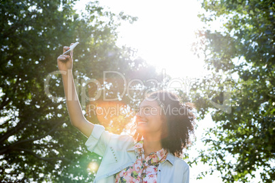 Pretty hipster using her smartphone