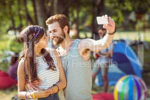 Hipster couple taking a selfie