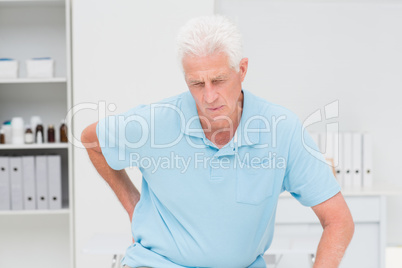 Senior man suffering from backache