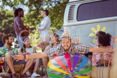 Happy hipsters having fun on campsite