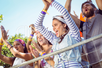 Excited music fans up the front