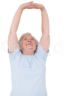 Senior woman stretching her arms