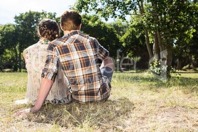 Cute couple relaxing in the park