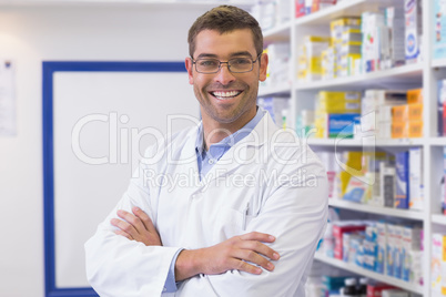 Handsome pharmacist smiling at camera Handsome pharmacist smiling at camera