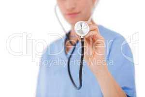 Doctor listening with stethoscope