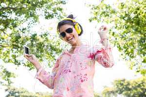 Pretty brunette listening to music