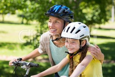 Mother and daughter on their bike