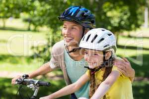 Mother and daughter on their bike