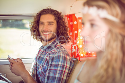 Hipster couple on road trip