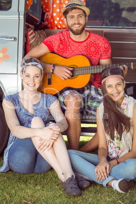 Hipster friends by their camper van