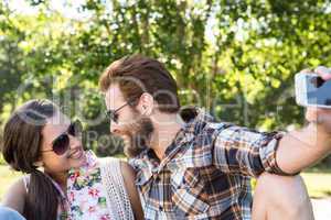 Young couple taking a selfie