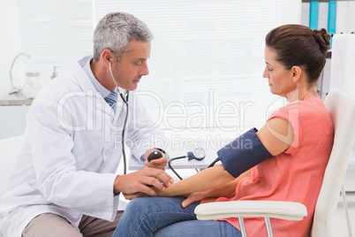 Doctor doing test at his patient