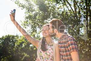 Hipster couple taking a selfie