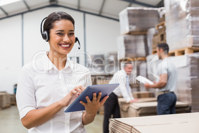 Female manager using digital tablet