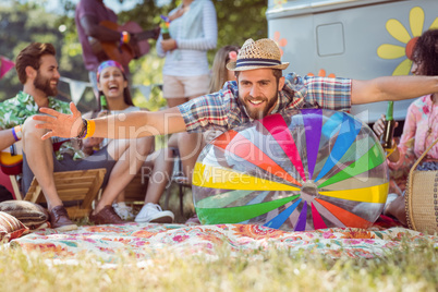 Happy hipsters having fun on campsite