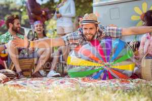 Happy hipsters having fun on campsite