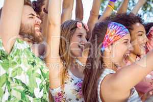 Happy hipsters listening to live music