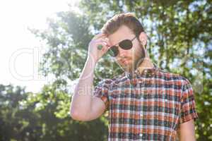 Handsome hipster wearing sunglasses
