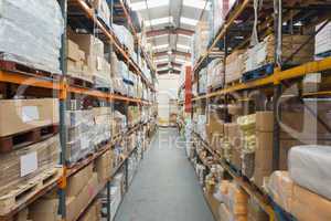 Shelves with boxes in warehouse